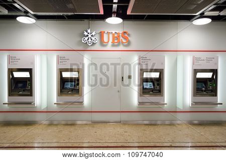 GENEVA, SWITZERLAND - NOVEMBER 19, 2015: UBS ATM in Geneva Airport. UBS AG is a Swiss global financial services company, incorporated in the Canton of Zurich
