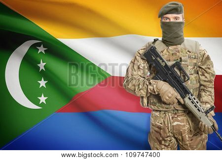 Soldier Holding Machine Gun With Flag On Background Series - Comoros