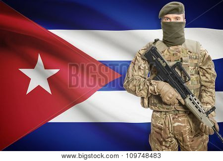 Soldier Holding Machine Gun With Flag On Background Series - Cuba