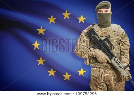 Soldier Holding Machine Gun With Flag On Background Series - European Union - Eu