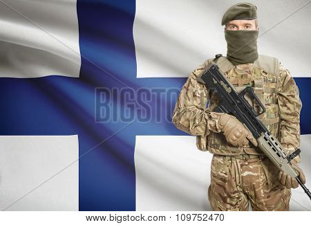 Soldier Holding Machine Gun With Flag On Background Series - Finland