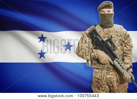 Soldier Holding Machine Gun With Flag On Background Series - Honduras