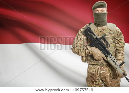 Soldier Holding Machine Gun With Flag On Background Series - Indonesia