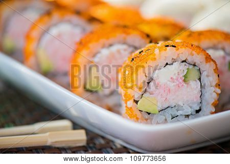 California maki sushi with orange masago