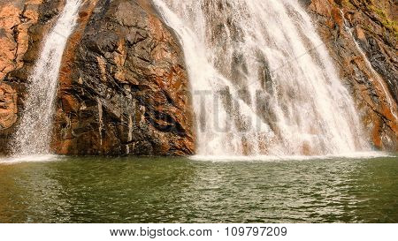 Bottom Of Dudhsagar Falls In The Tropical Jungle Of India