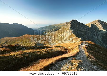 Panorama of Tatra Mountains Carpathians sun sunset dawn Nature background Nature landscape Nature background sky colors vibrant Nature background Travel Tourism hiking Adventure Mount Nature background sunrise Nature background Summit Peaks mountain.
