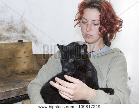 Zookeeper With A Jaguar Cub