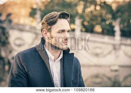 Handsome young man outdoor in winter fashion