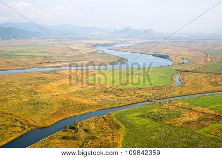 Beautiful autumn landscape in the valley of the river from a birds-eye. Primorsky Kray, Russia