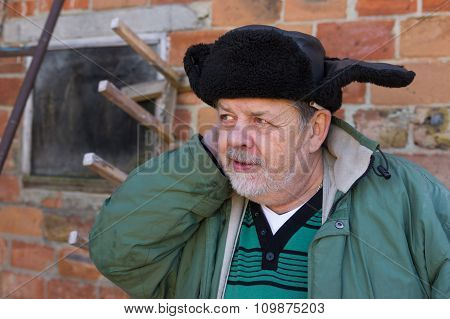 Outdoor portrait of a bearded Ukrainian peasant