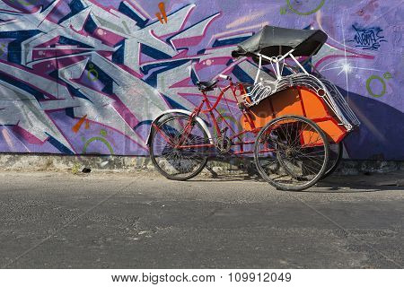 Colorful Becaks On A Street Of Yogjakarta, Indonesia.