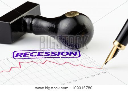 Close Up Of Recession Stamp And Graph