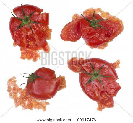 Splattered tomatoes isolated on white background
