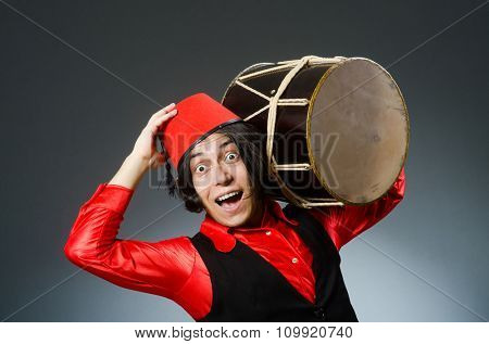 Man wearing red fez hat