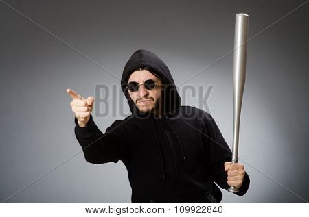 Aggressive man with basebal bat 
