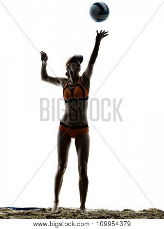 one woman beach volley ball player silhouette in studio silhouette isolated on white background