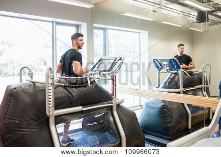 Athlete working out on an anti gravity treadmill at the gym