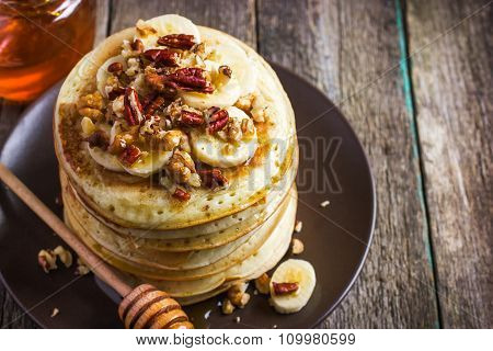 Pancakes With Banana, Nuts And Honey