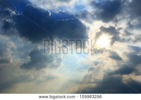 The sunlight behind clouds before sun set