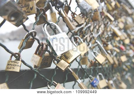 Paris, France - March 18, 2012: Padlocks in Pont de l'Archev?ch? from lovers as a symbol of their love.