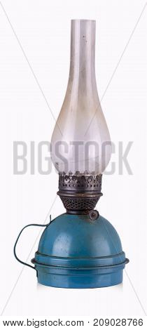 The old shabby kerosene lamp. The lamp of past times. Isolated. On a white background