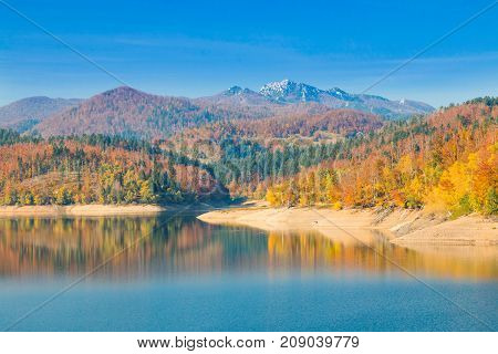 Panoramic view of Lokvarsko lake, beautiful colorful mountain autumn landscape, Lokve, Gorski kotar, Croatia