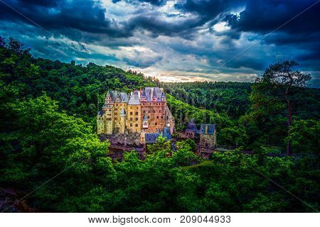 Eltz Castle in Rhineland-Palatinate, Germany. Beautiful landscape with medieval architecture.