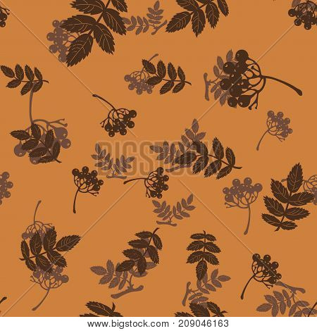 seamless pattern with leaves and berries of mountain ash on a light brown background