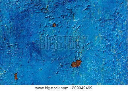 peeling blue paint on a metal surface texture background.