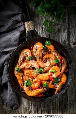 Tasty Shrimps On Pan With Parsley And Garlic