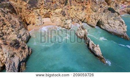 Aerial. Rocks and beaches near the beaches of Portimao.