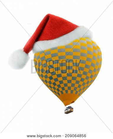Red Santa hat on Hot air xmas balloon isolated on white background
