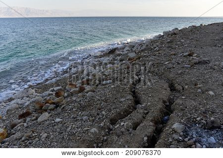 Landslip cracks at Dead Sea contaminated coast in Israel.