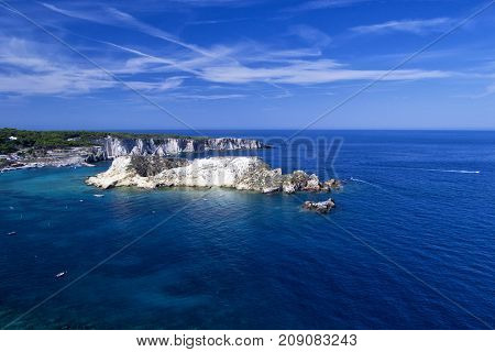 Tremiti islands with blue water boats and clouds. Gargano. Puglia. for nature travel and holyday concepts