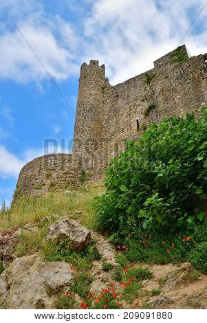 Wall and tower of the Obidos castle. Obidos is an ancient medieval Portuguese village from the 11th century still inside castle walls. Obidos Portugal