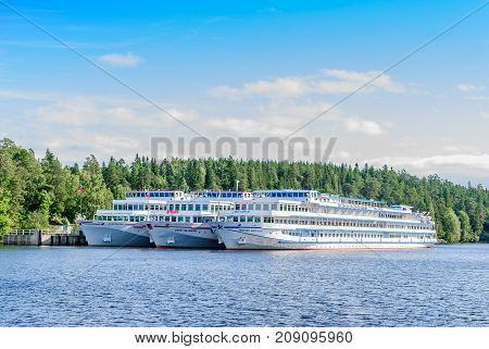 Island Valaam Russia - September 6 2017: Tourist boats moored at the pier on the island of Valaam. in Valaam Russia