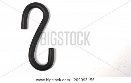 S-shaped hook on white background, note select focus with shallow depth of field