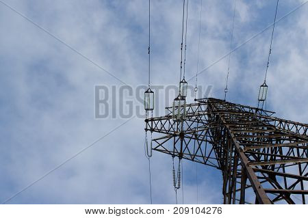 High voltage line on blue sky background