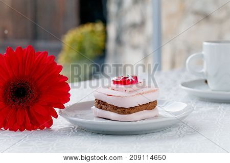 Wedding cake with bright flowers on top