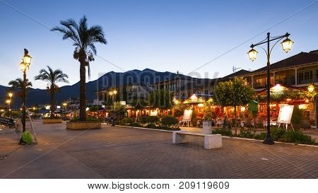 NYDRI, GREECE - OCTOBER 2, 2017: Seafront of Nydri village on Lefkada island in Greece on October 2, 2017.