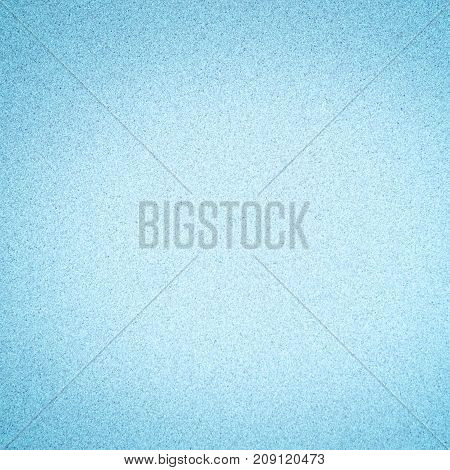 Abstract Decorative Light Blue Background with dark vignette. Granular Texture. Beautiful Christmas Paper With Copy Space for design. Square Wallpaper