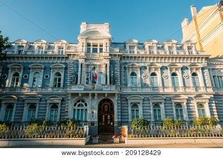 Riga, Latvia. Embassy Of France In Latvia. Facade Of Building Under Blue Clear Sky At Sunny Summer Day.
