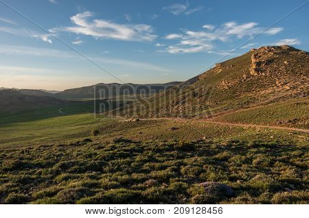 Moss Covered Highland Valley In Middle Atlas Mountain Range In Sunset, Morocco, Africa