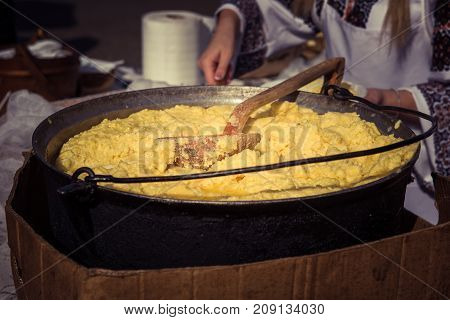 Hominy Prepared In A Caldron On Fire