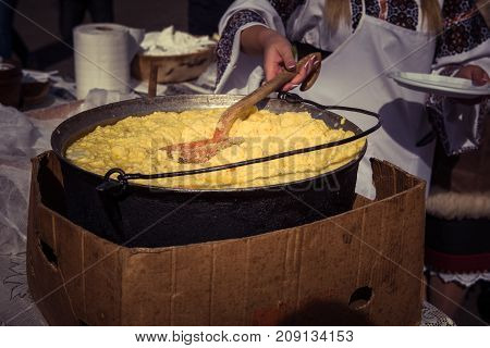 Hominy Prepared In A Caldron On Fire