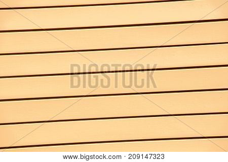 Texture details of an old wooden plunks as background