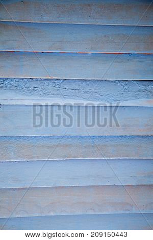 Texture details of an old wooden plunks as background