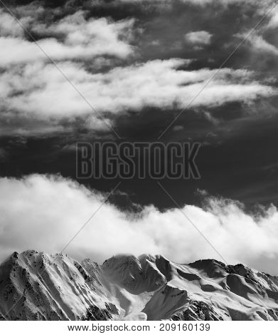 Black and white winter snow mountains at nice sun evening. Caucasus Mountains. Georgia region Svaneti.