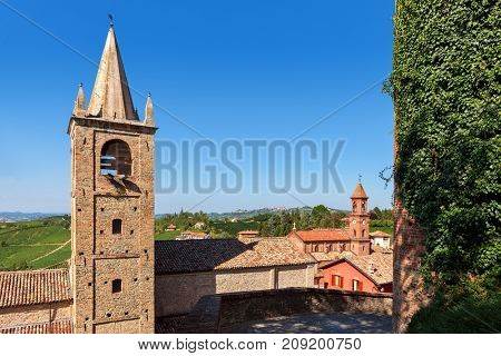 Old houses and belfries in small italian town of Serralunga d'Alba in Piedmont, Northern Italy.