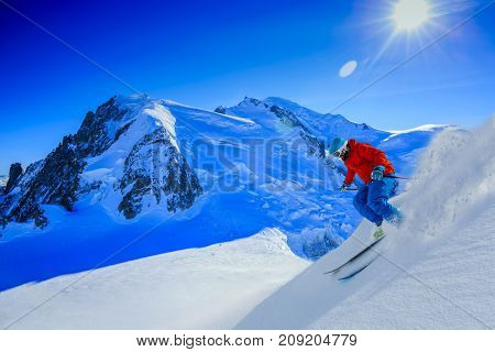 Skiing Vallee Blanche Chamonix with amazing panorama of Grandes Jorasses and Dent du Geant from Aiguille du Midi, Mont Blanc mountain, Haute-Savoie, France